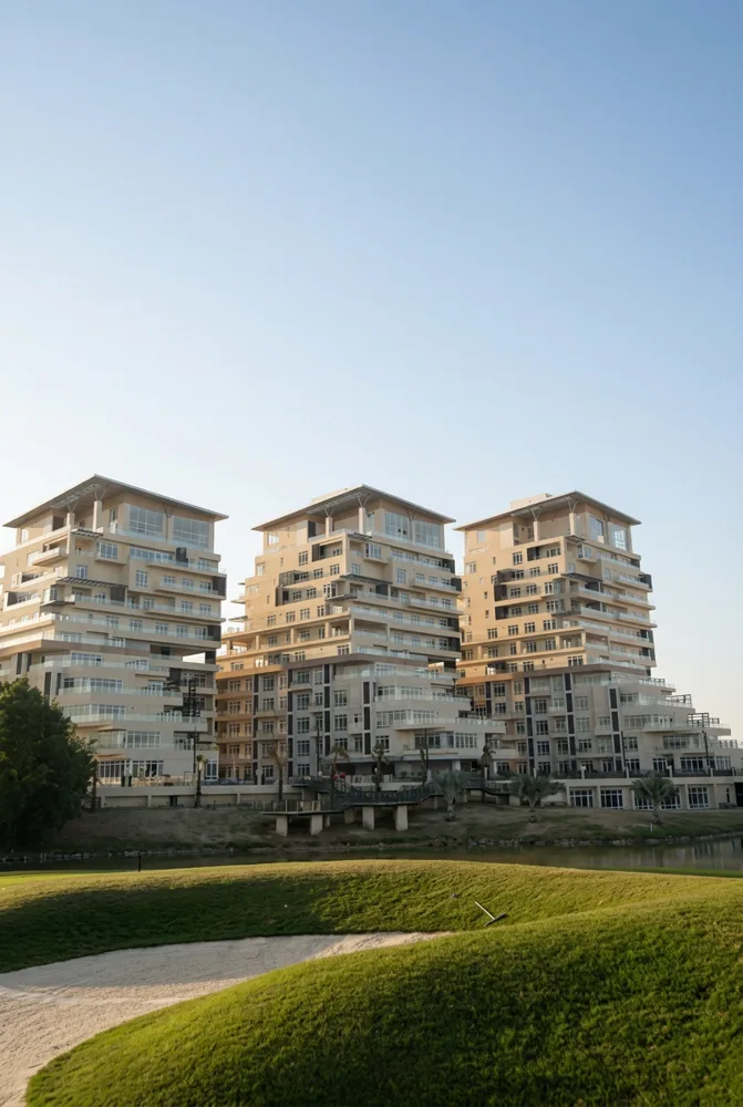 DHA Raya apartment towers beside the golf fairway, based on the owner’s supplied photograph